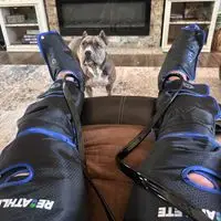 Air-C Compression Massager customer photo shared by reviewer relaxing during a session